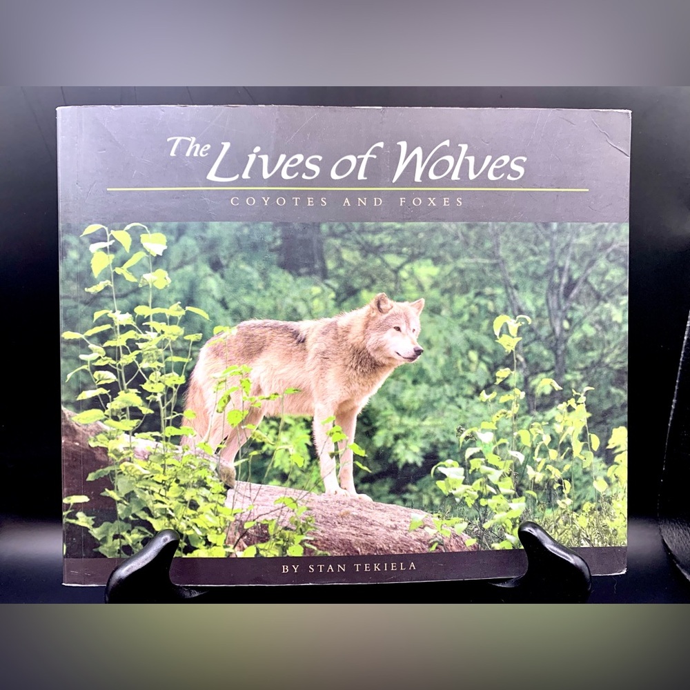 The Lives of Wolves, Coyotes and Foxes
by Stan Tekiela